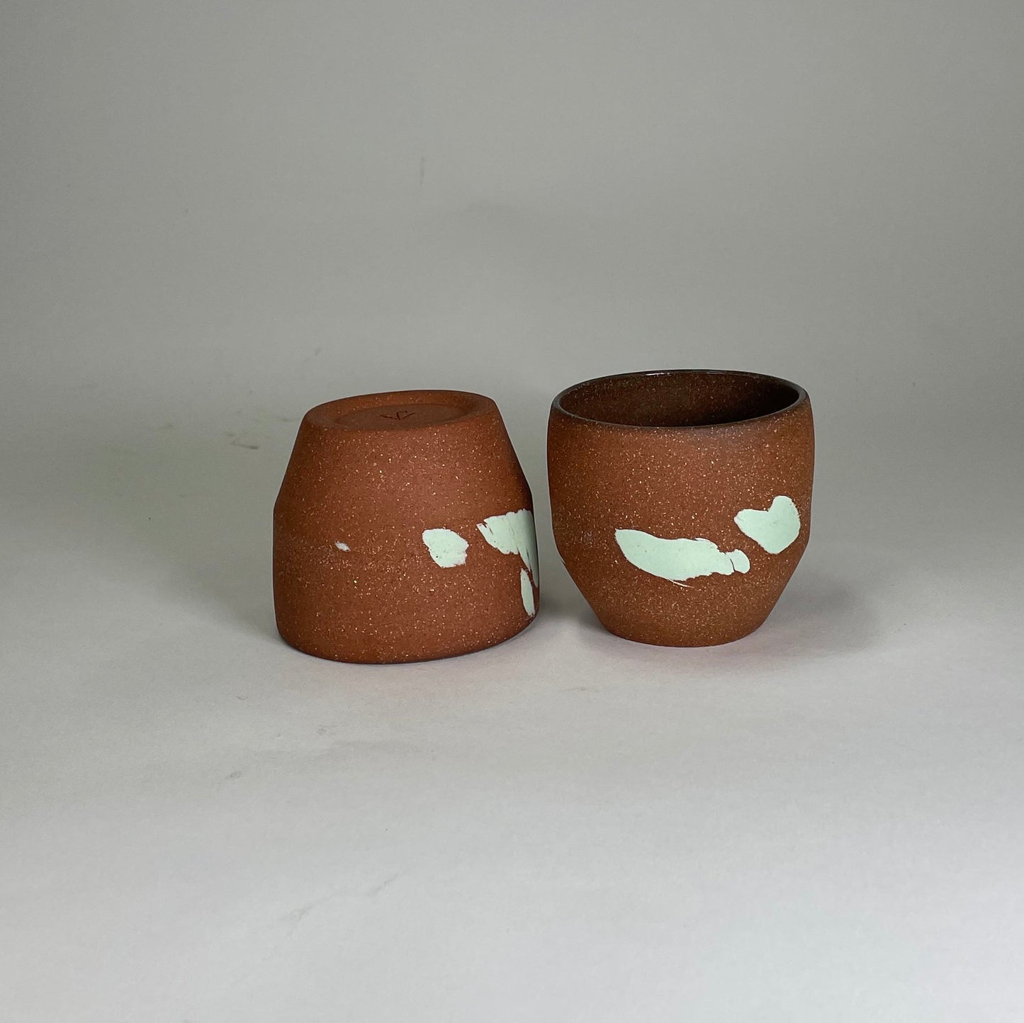  2 ceramic wine glasses
