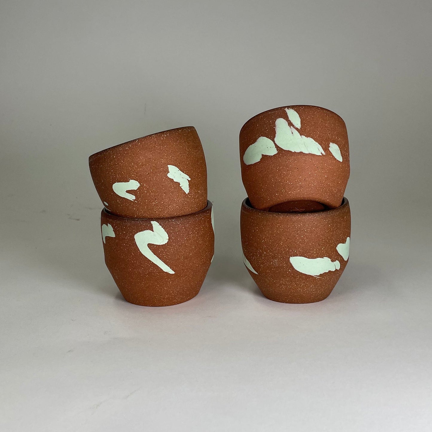  2 ceramic wine glasses