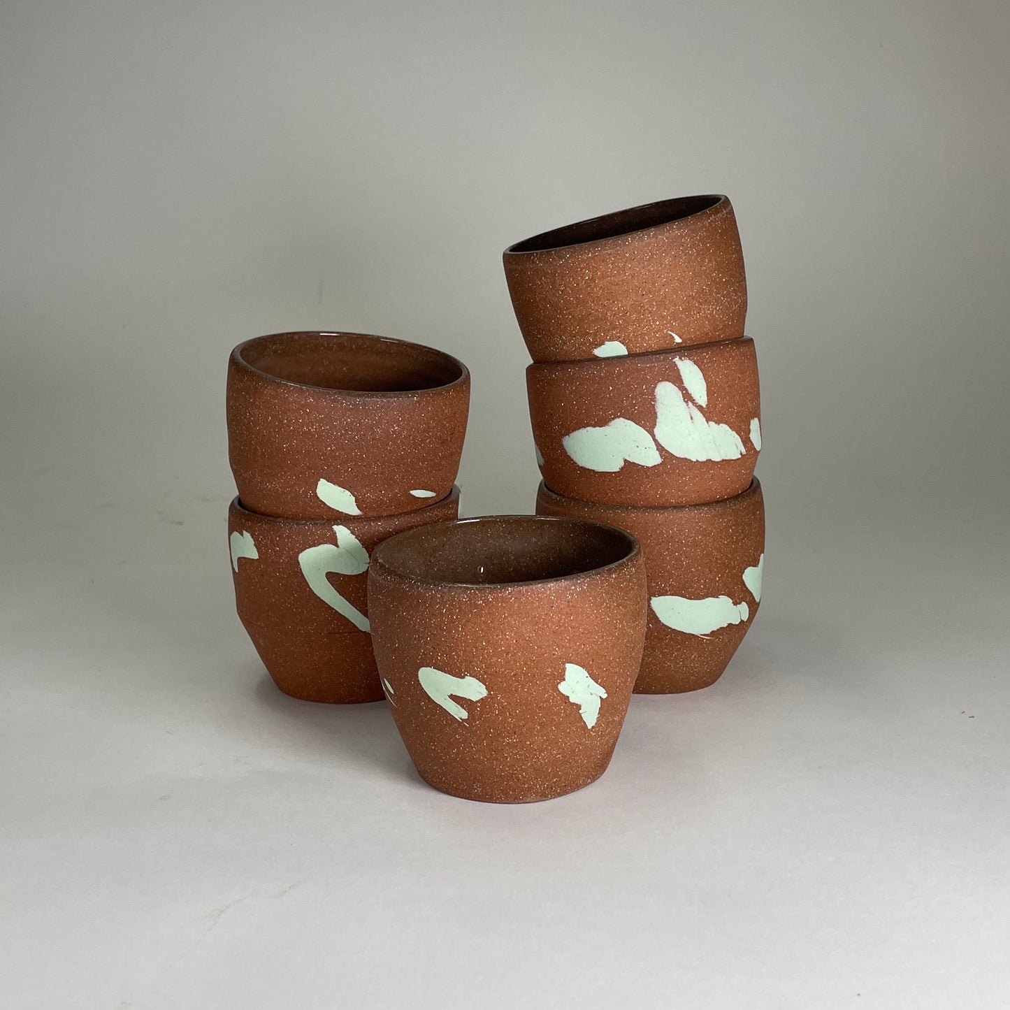  2 ceramic wine glasses