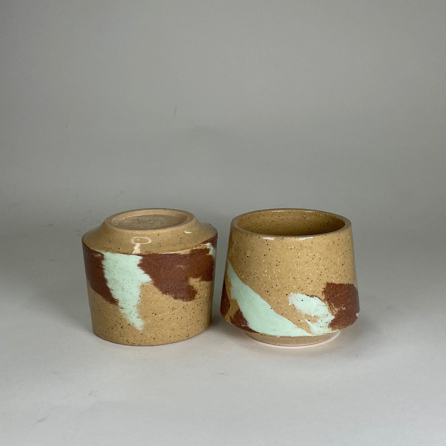  2 ceramic wine glasses